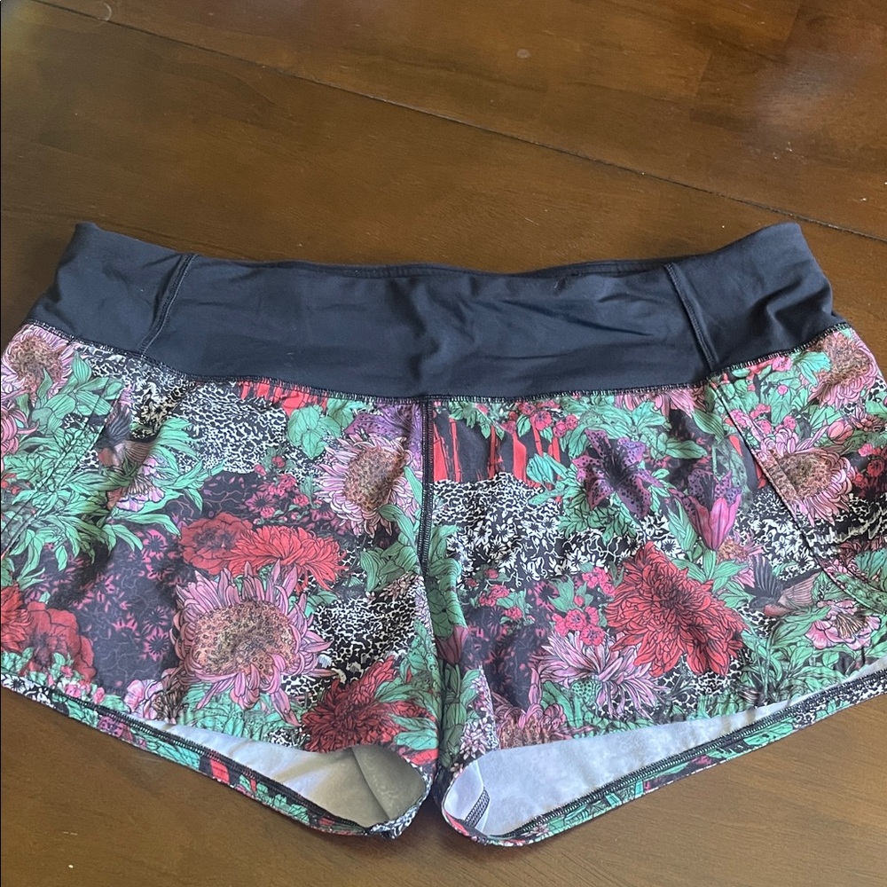 Lululemon Speed Up jungle print shorts, 4”, size 10.